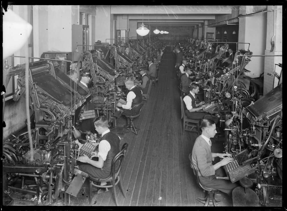  Men working on the linotype machines in the Sydney Morning Herald building on Hunter Street, Sydney, ca. 1930